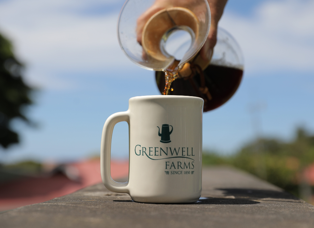 Pouring Kona Coffee in a Greenwell Farms Cup