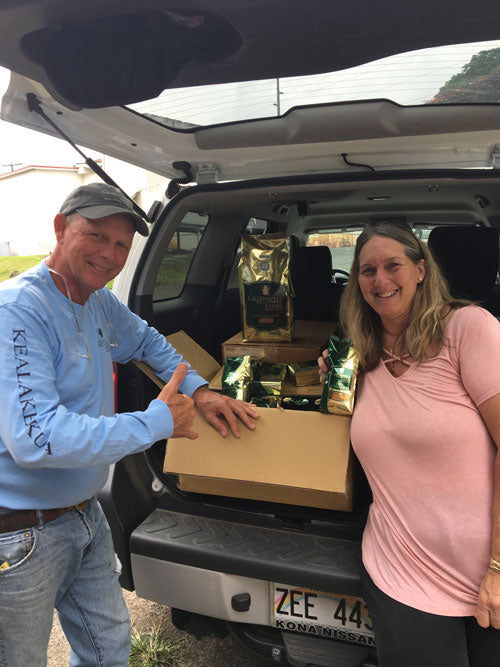 Tom and Jennifer Greenwell with donated coffee.